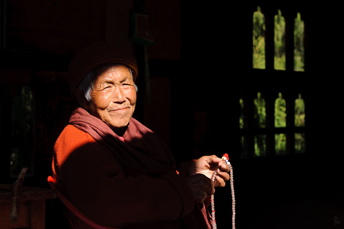 Bhutanese woman inside a monastery, Thimphu